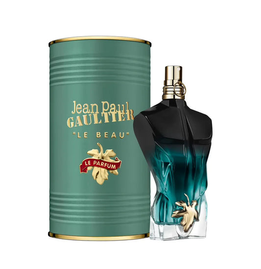 Jean Paul Gaultier perfume bottle and green cylindrical container on a white background