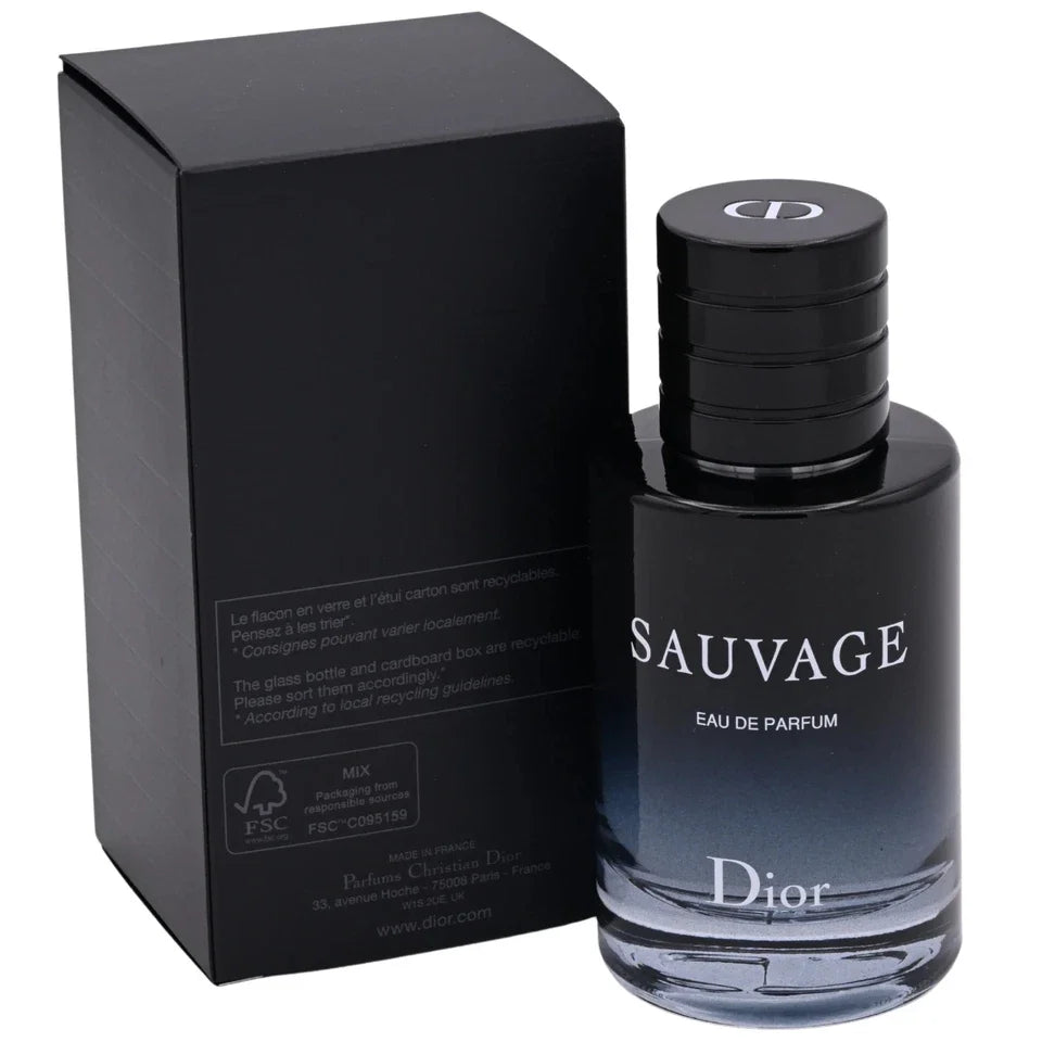 Dior Sauvage Eau de Parfum bottle next to its black packaging box, featuring a dark gradient glass bottle and a black cap with the Dior logo.