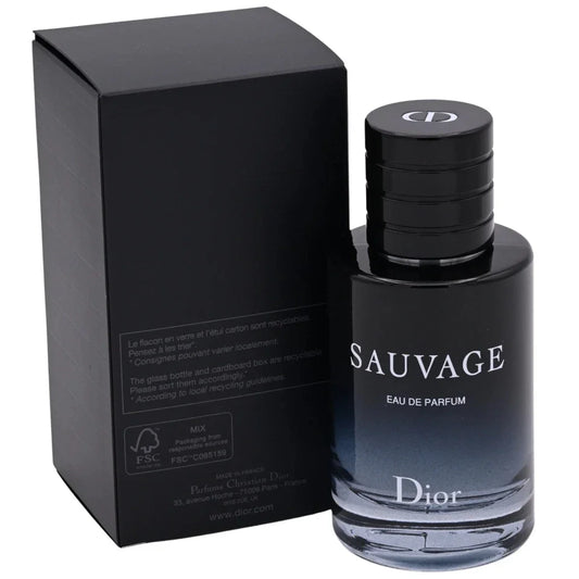 Dior Sauvage Eau de Parfum bottle next to its black packaging box, featuring a dark gradient glass bottle and a black cap with the Dior logo.